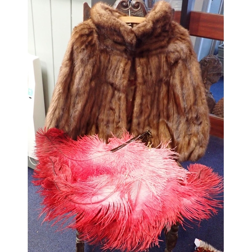 55 - A FUR CAPE AND A OSTRICH FEATHER TORTOISHELL FAN with bowler hats and similar items