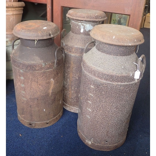 7 - THREE VINTAGE MILK CHURNS