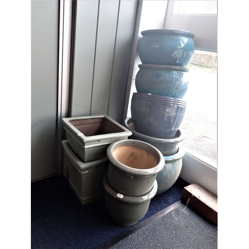 8 - A COLLECTION OF GLAZED GARDEN POTS various shapes and colours