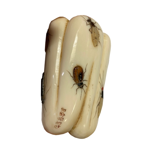 95 - A JAPANESE IVORY OKIMONO in the form of a pepper, with fine Shibayama decoration of insects, with a ... 