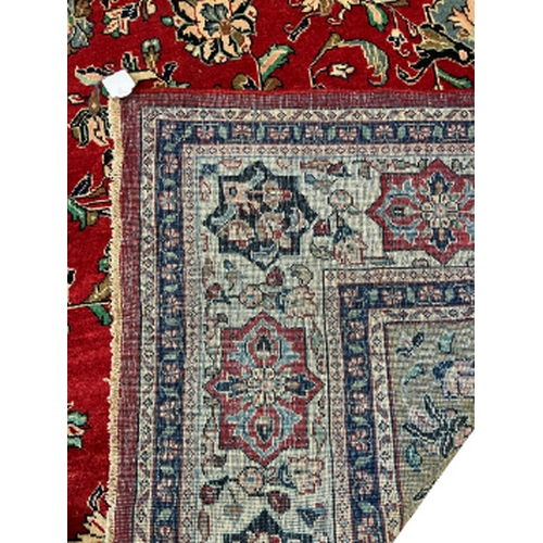 182 - A NORTH WEST PERSIAN MAHAL CARPET 20th century, with a central diamond medallion against a red groun... 