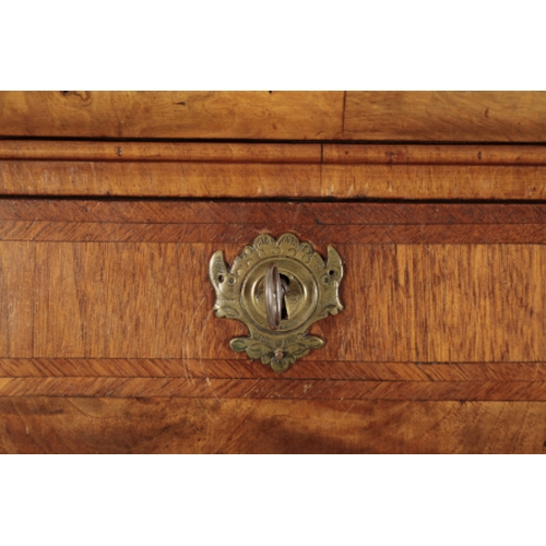 191 - A QUEEN ANNE WALNUT WRITING CABINET early 18th century, the top section with a moulded pediment abov... 