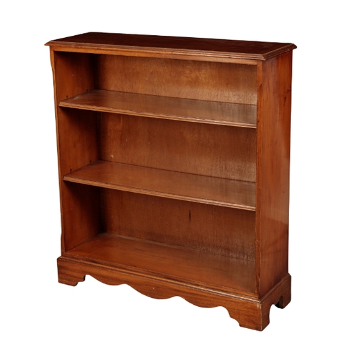 243 - AN OPEN BOOKCASE 20th century, on a shaped pedestal base with bracket feet, 104cm high x 95cm wide x... 