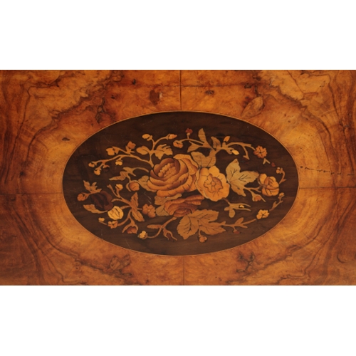 295 - A VICTORIAN WALNUT AND MARQUETRY CENTRE TABLE 19th century, the quarter veneered oval top centered b... 