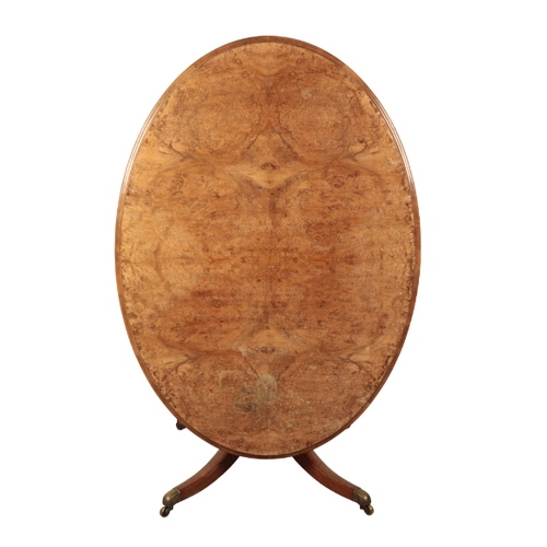 310 - A VICTORIAN WALNUT CENTRE TABLE 19th century, the oval tilt-top quarter veneered with burr walnut, o... 