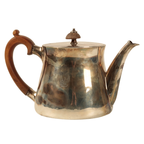 40 - A 20TH CENTURY SILVER TEAPOT by Garrard & Co Ltd, London, 1904, of circular tapering form, the body ... 