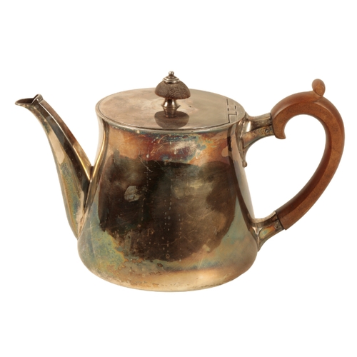 40 - A 20TH CENTURY SILVER TEAPOT by Garrard & Co Ltd, London, 1904, of circular tapering form, the body ... 