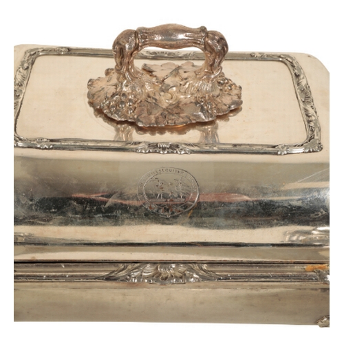 58 - A SET OF THREE REGENCY SILVER PLATED ENTREE DISHES of rectangular form, a formed handle decorated wi... 