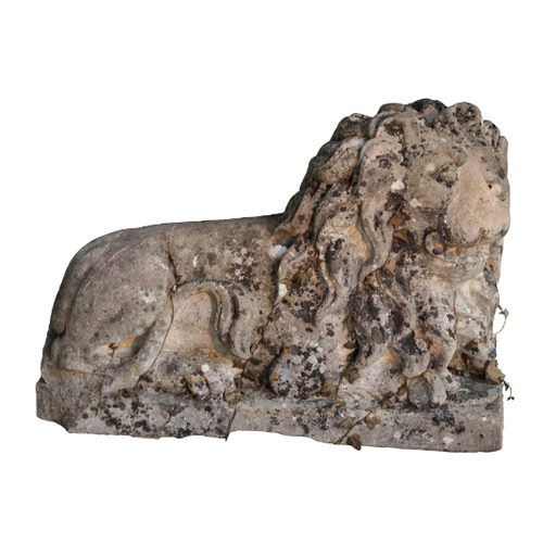 86 - A PAIR OF COMPOSITION STONE LIONS 19th/20th century, each on a rectangular plinth, the plinths 88cmx... 