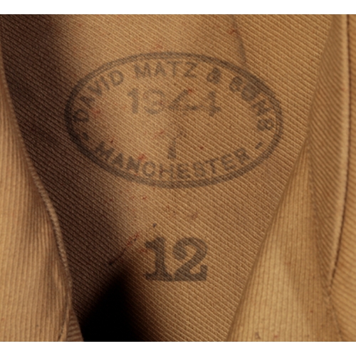 102 - A DESPATCH RIDERS COAT by David Matz & Sons, Manchester, dated 1944, size 12; and a pair of despatch... 