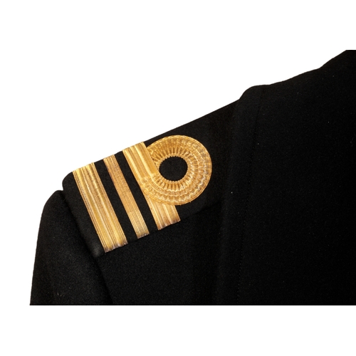 118 - A BRITISH NAVAL GREAT COAT made by CH Bernard & Sons of Essex