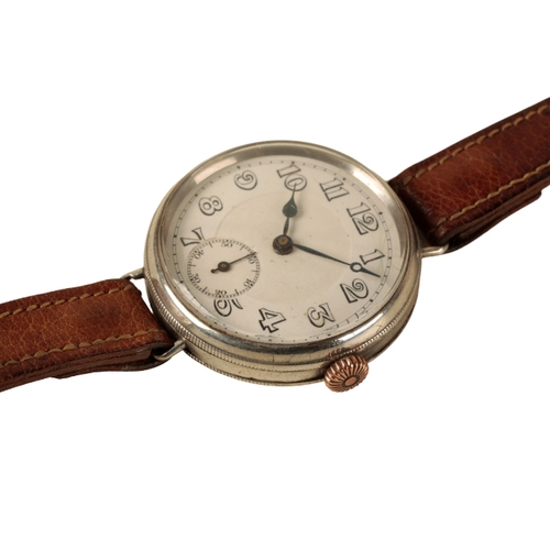 30 - A GENTLEMAN'S SILVER CASED TRENCH WATCH with manual wind movement, the white enamel dial with subsid... 