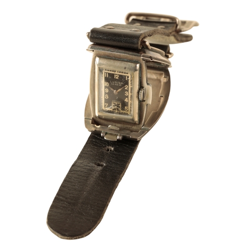 31 - LAUSINA: A RARE GERMAN SILVER MILITARY WRISTWATCH with manual wind movement, the black dial with sub... 