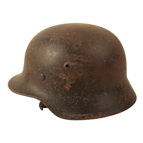 52 - A WWII GERMAN M35 DOUBLE DECAL LUFTWAFFE HELMET with original leather liner and chin strap, with own... 