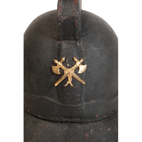 56 - A LATE 19TH CENTURY LEATHER  FIRE HELMET with original leather lining.