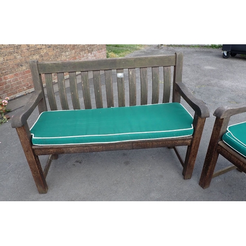 11 - A PAIR OF WEATHERED TEAK GARDEN BENCHES, WITH CONTOURED BACK SPLATS each 123cm wide (some decay to b... 