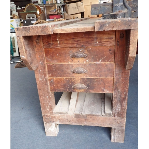 12 - A LARGE CARPENTER'S WORKSHOP BENCH Circa early/mid 20th century, fitted three drawers each end, well... 