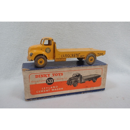 146 - A DINKY TOYS 533 LEYLAND CEMENT WAGON AND A 555 FIRE ENGINE with extending ladder, some wear and dam... 