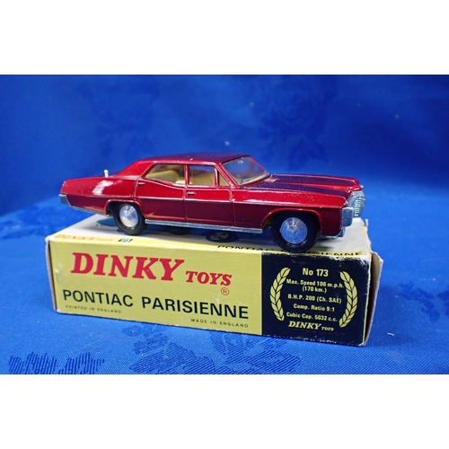 150 - DINKY TOYS 'MORRIS 1100' AND 'PONTIAC PARISIENNE' with a Matchbox 66 'Greyhound Coach'