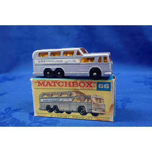 150 - DINKY TOYS 'MORRIS 1100' AND 'PONTIAC PARISIENNE' with a Matchbox 66 'Greyhound Coach'