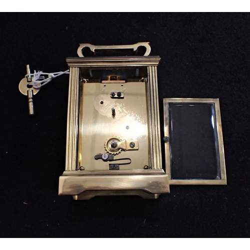 170 - A BRASS-CASED CARRIAGE CLOCK (WORKING) (with presentation inscription, and back door hinge pins miss... 