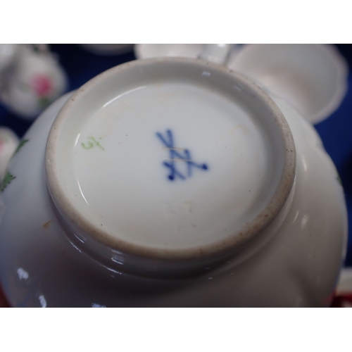 254 - A 20TH CENTURY MEISSEN TEA SERVICE (some chips) (all cups, saucers and both coffee pots have two str... 