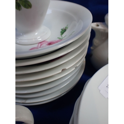 254 - A 20TH CENTURY MEISSEN TEA SERVICE (some chips) (all cups, saucers and both coffee pots have two str... 