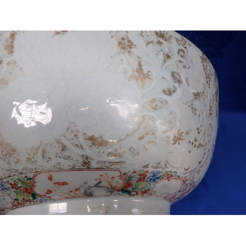 295 - 18th CENTURY CHINESE BLANC DE CHINE BOWL with carved peony designs, with later clobbered enamel deco... 