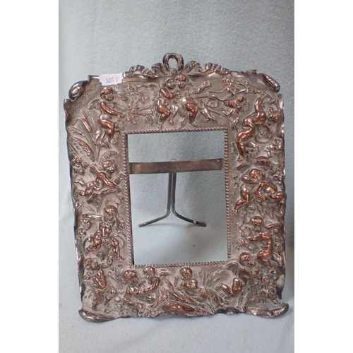 319 - A PAIR OF SILVER PLATED CHERUB RELIEF PHOTOGRAPH FRAMES 29.5 X 23 CM