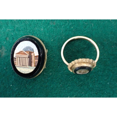 357 - A GRAND TOUR MICRO MOSAIC RING depicting ancient ruins, with a high carat gold cannetille surround a... 