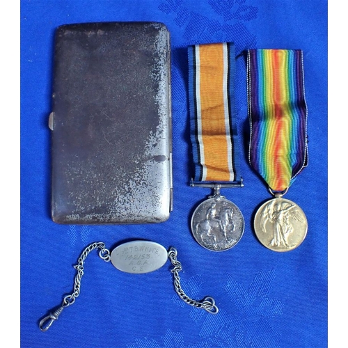 419 - A FIRST WORLD WAR PAIR awarded to 142153. GNR. T. B. WHITE. R. A. , and a matching silver identity b... 