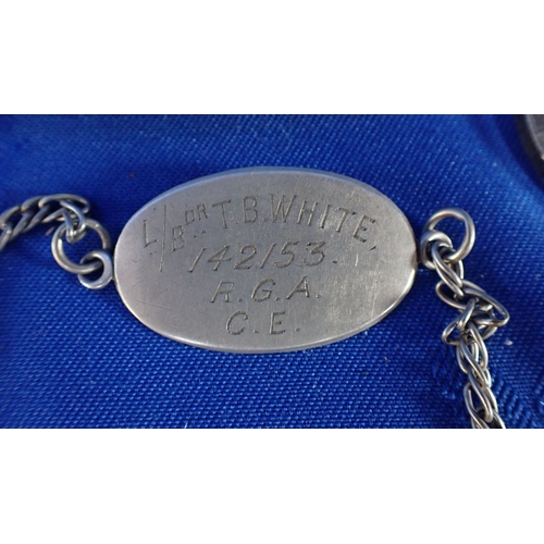 419 - A FIRST WORLD WAR PAIR awarded to 142153. GNR. T. B. WHITE. R. A. , and a matching silver identity b... 