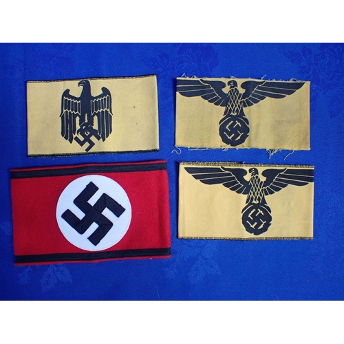 421 - FOUR NAZI STYLE CLOTH ARMBANDS