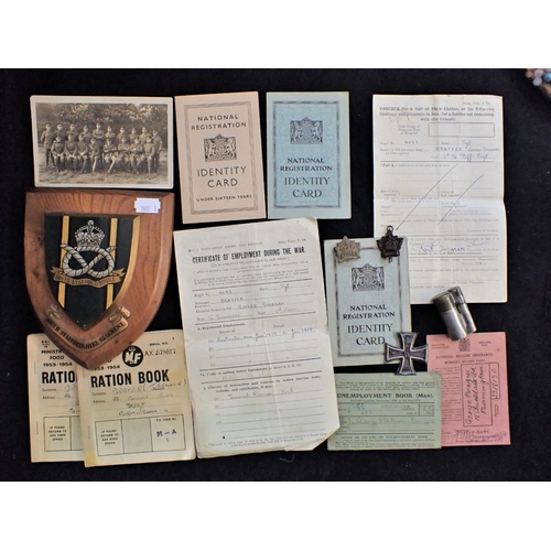 424 - AN IRON CROSS, A TRENCH ART LIGHTER ID cards and other items