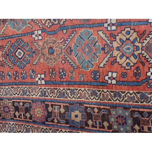 617 - AN ANTIQUE BIJAR RUG 128 x 222cm (frayed, worn) and a Turkmen Asmalyk bag face, possibly Yomut (2)