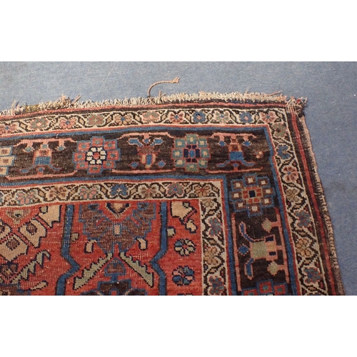 617 - AN ANTIQUE BIJAR RUG 128 x 222cm (frayed, worn) and a Turkmen Asmalyk bag face, possibly Yomut (2)