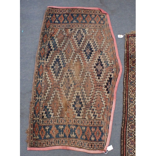 617 - AN ANTIQUE BIJAR RUG 128 x 222cm (frayed, worn) and a Turkmen Asmalyk bag face, possibly Yomut (2)