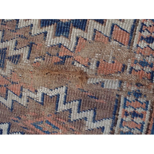 617 - AN ANTIQUE BIJAR RUG 128 x 222cm (frayed, worn) and a Turkmen Asmalyk bag face, possibly Yomut (2)