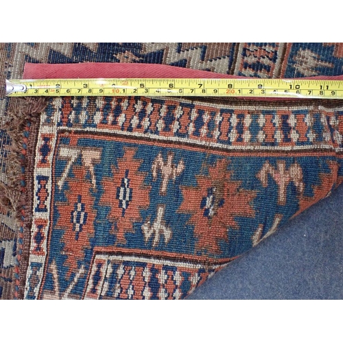 617 - AN ANTIQUE BIJAR RUG 128 x 222cm (frayed, worn) and a Turkmen Asmalyk bag face, possibly Yomut (2)