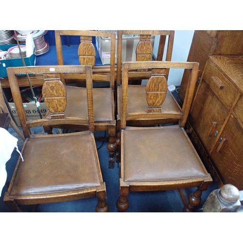 642 - A 1930S OAK SIDEBOARD, FOUR CHAIRS with drop-in seats, an oak trolley with barley-twist legs, a smal... 