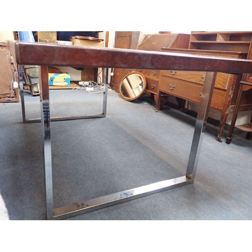 643 - A MODERNIST DINING TABLE, IN THE STYLE OF TIM BATES FOR PIEFF (not labelled) with mahogany veneered ... 