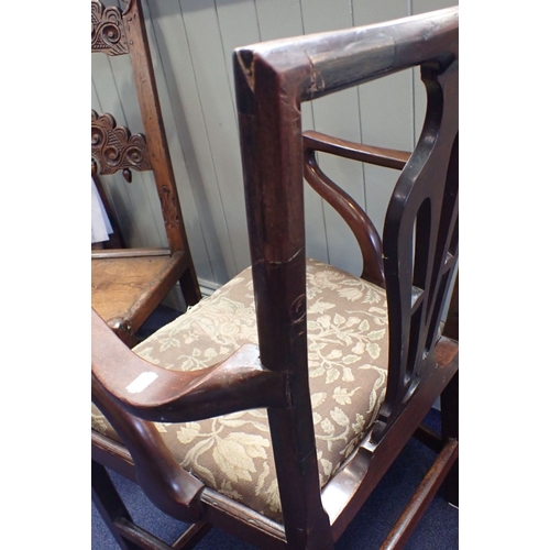 656 - A GEORGE III STYLE ELBOW CHAIR with several old repairs