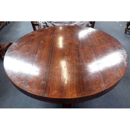 679 - A WILLIAM IV ROSEWOOD BREAKFAST TABLE with tip-up top on octagonal shaft and platform base 121cm dia... 