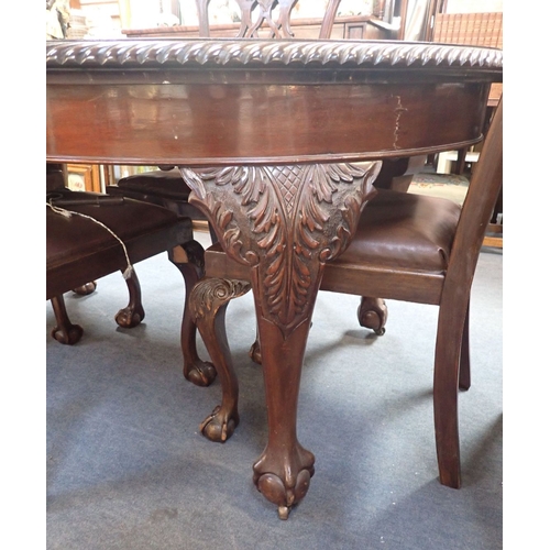 682 - AN EDWARDIAN CHIPPENDALE REVIVAL DINING TABLE AND FOUR CHAIRS mahogany, with carved and pierced spla... 