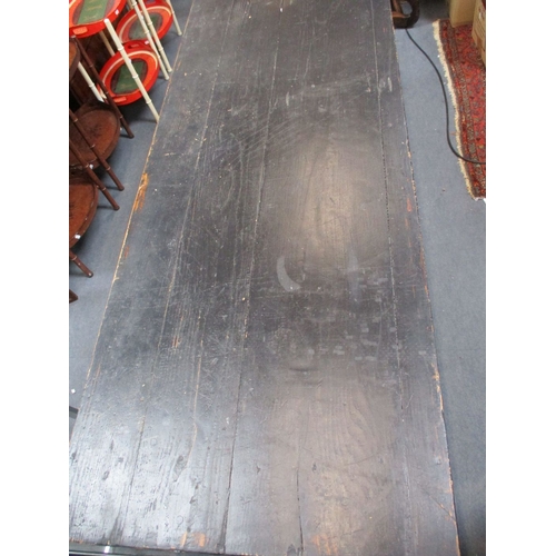 689 - A REFECTORY STYLE TABLE WITH CAST IRON BASE and black painted pine boarded top 197 x 72cm, 75cm high