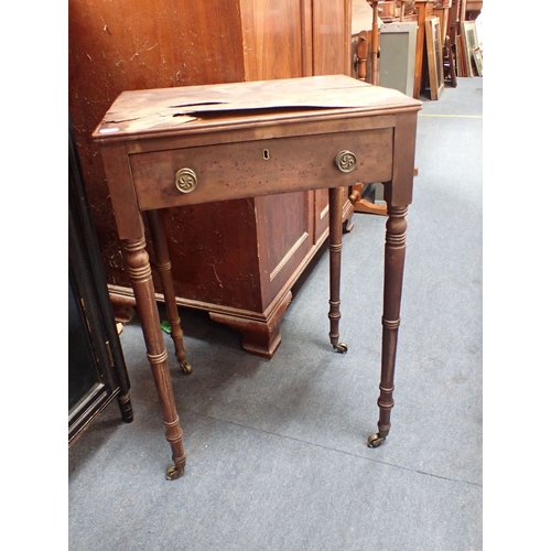 729 - A REGENCY MAHOGANY WORKTABLE on slender turned legs (in distressed condition)