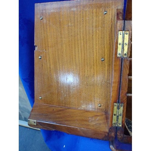 123 - A VICTORIAN OAK STATIONERY BOX together with a gilt framed wall mirror