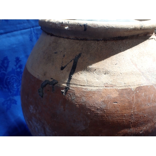 185 - A TABLE LAMP, CONVERTED FROM AN ANTIQUE OLIVE JAR terracotta, with patinated brass fittings 49cm hig... 