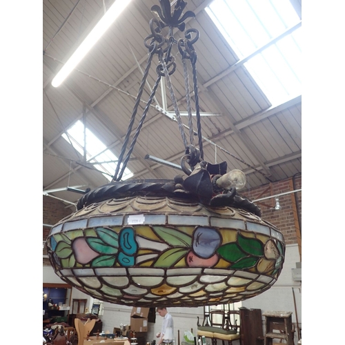 194 - AN EARLY 20TH CENTURY LEADED COLOURED GLASS PENDANT LIGHT the scale pattern with snapped pontil piec... 