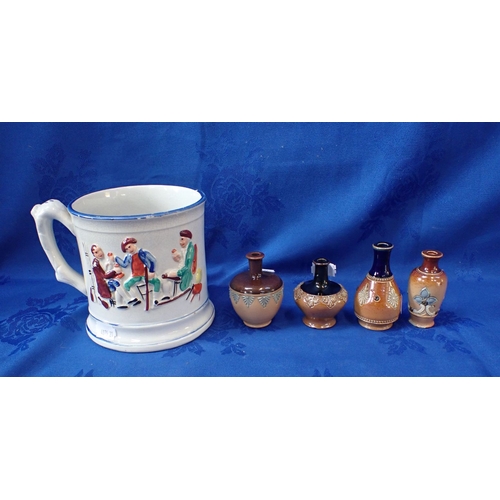 283 - A 19TH CENTURY SURPRISE FROG MUG with four miniature Royal Doulton stoneware vases